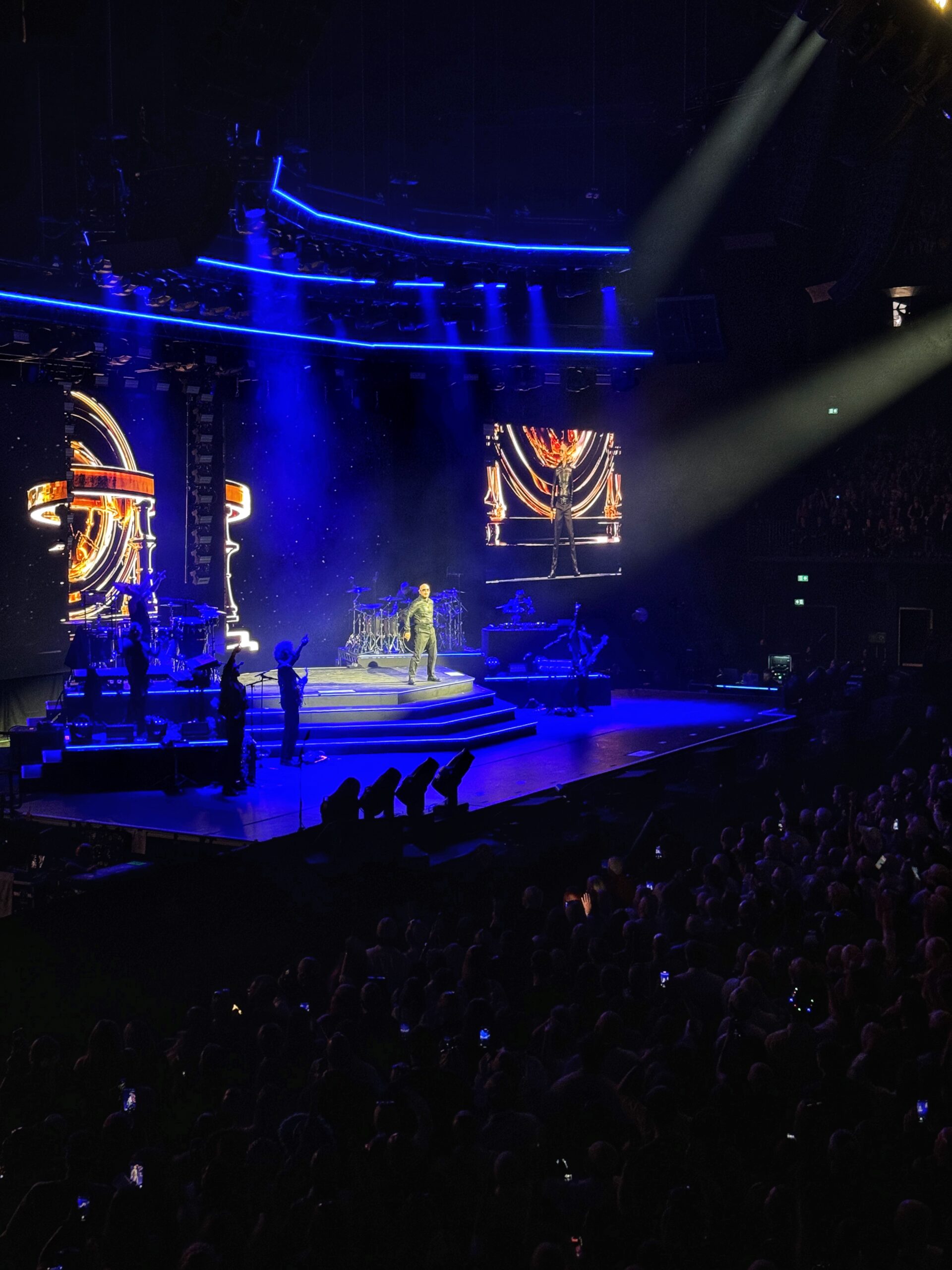 Pitbull staring out at his fans between songs in Manchester