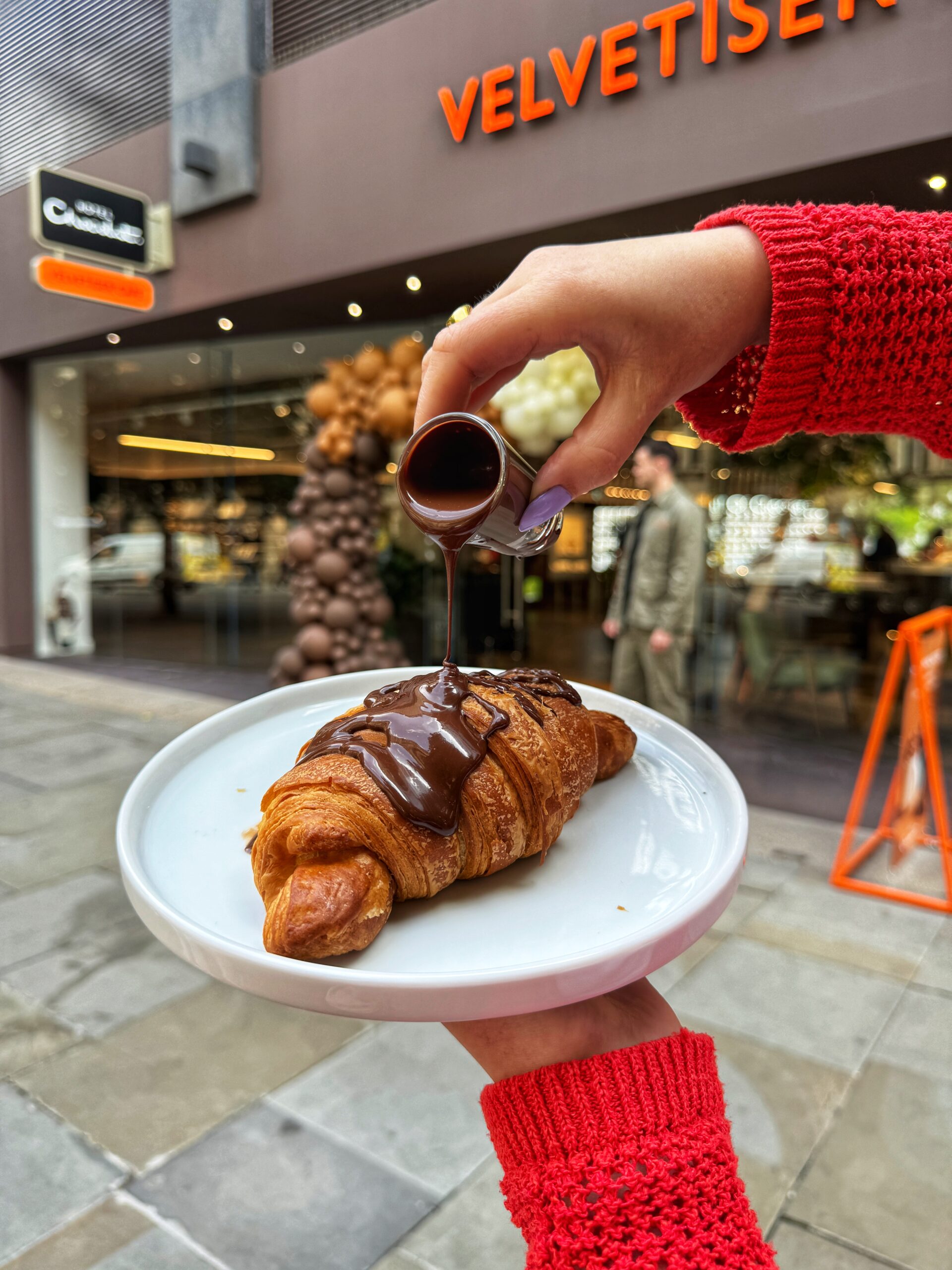 Croissant with a molten chocolate pot