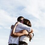 Two people hugging