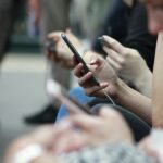 People on mobile phones