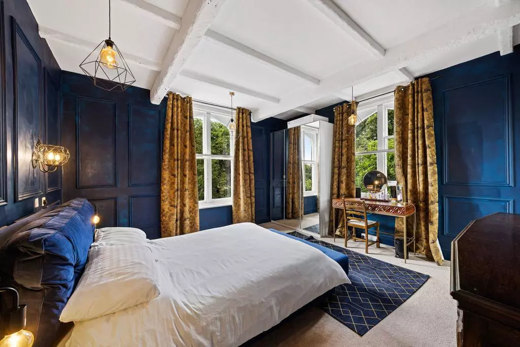 Two contrasting bedrooms found within this Victorian mansion near Greater Manchester / Credit: On The Market