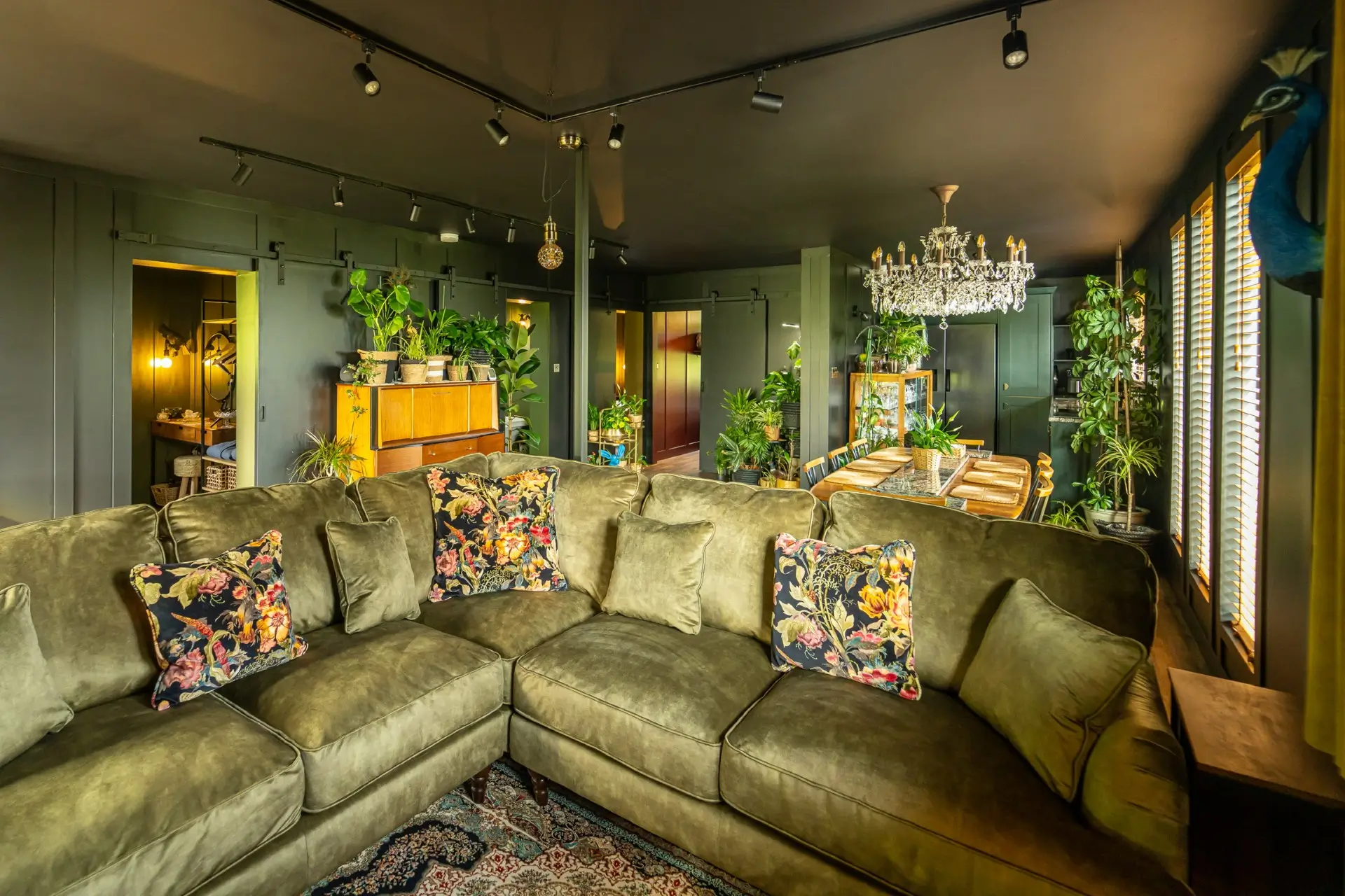 The living area and bathroom at Hous Viridis, where you can stay in a converted shipping container / Credit: Hous Viridis