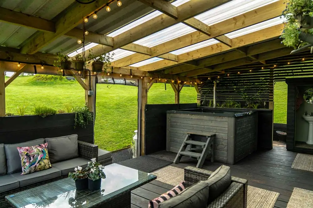 The outdoor space at Hous Viridis, which is a converted shipping container less than an hour from Manchester / Credit: Hous Viridis