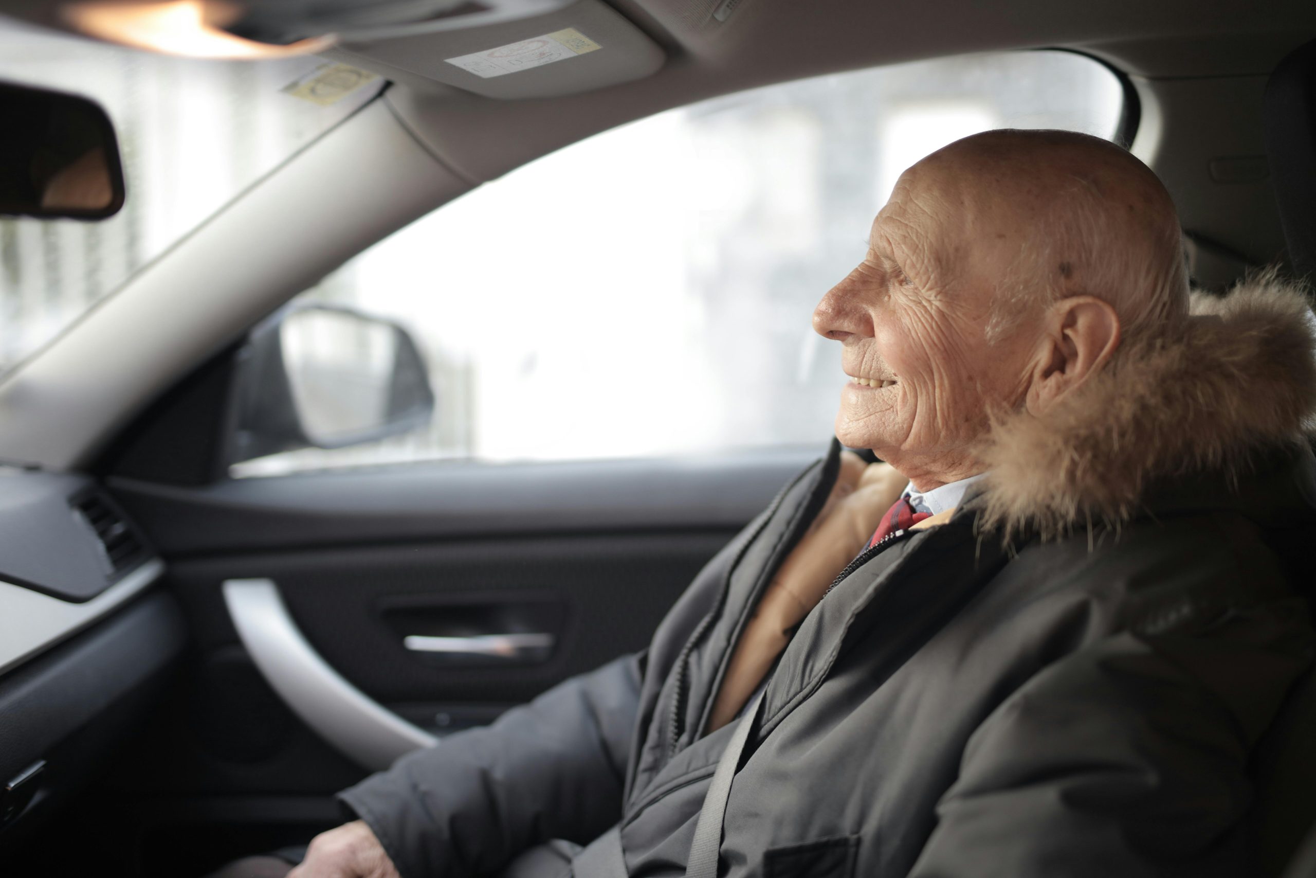 Old man in a car