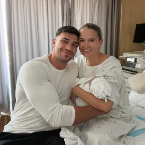 Molly-Mae Hague and Tommy Fury with their new baby boy, Midas.