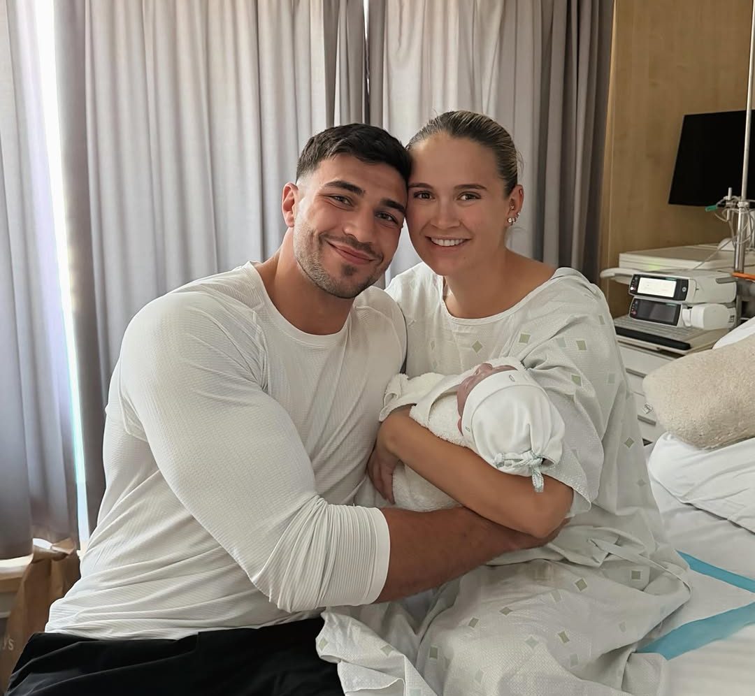 Molly-Mae Hague and Tommy Fury with their new baby boy, Midas.