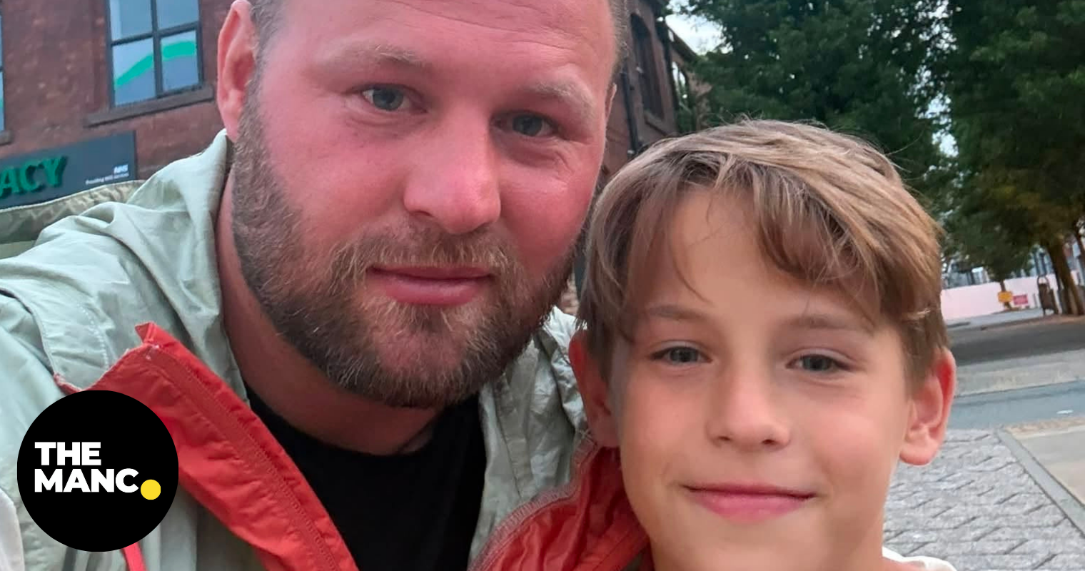 A Wigan dad is searching for the ‘hero' who helped calm his son's panic attack while on a busy train
